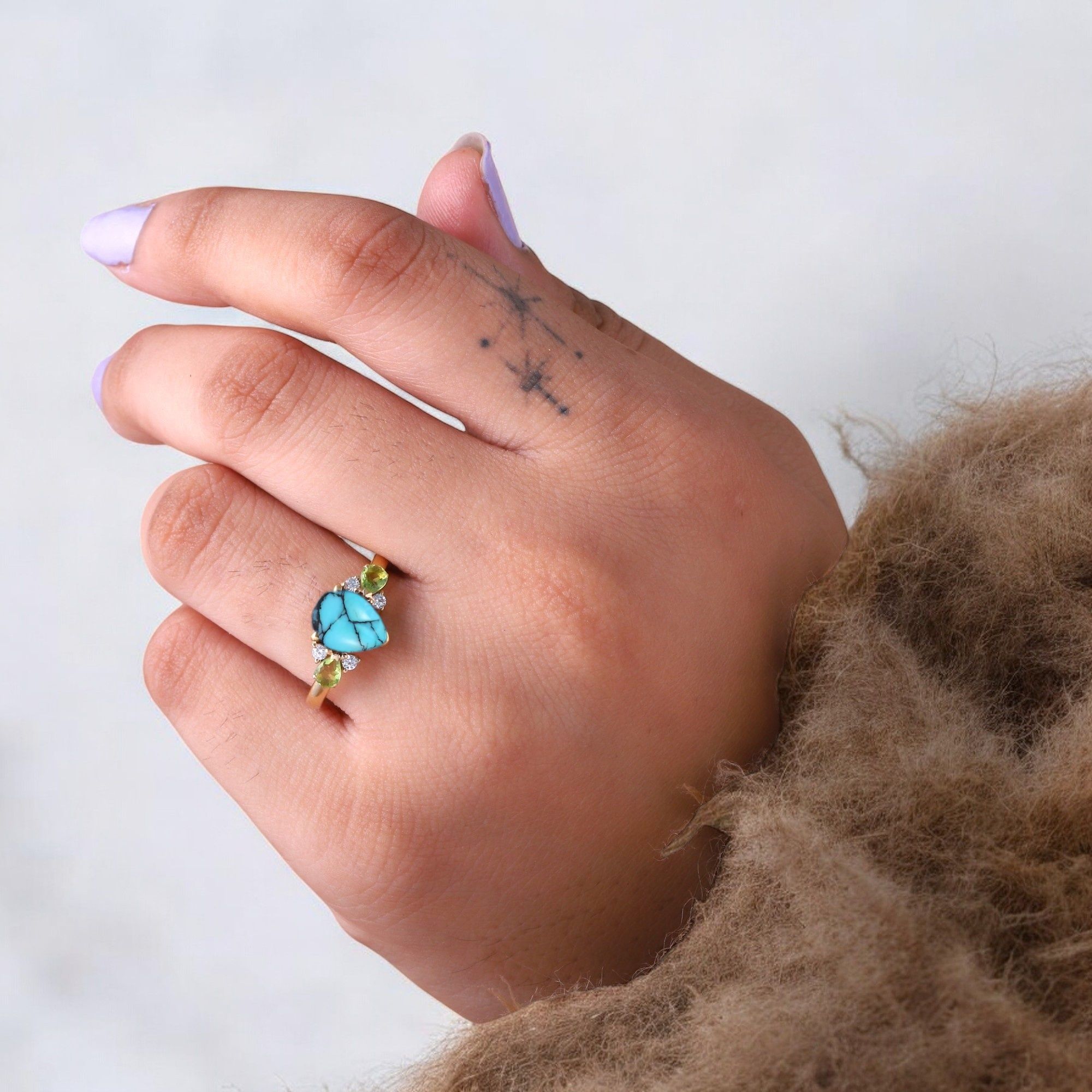 Pear Cut Turquoise Ring Art Deco Handmade Proposal Ring Peridot Alternative Cluster Women Jewelry CZ Diamond Gift Ring For Her Turquoise Ring for Women: A Symbol of Beauty, Protection & Love 💙✨ A turquoise ring is a timeless and meaningful piece of jewelry, known for its vibrant blue-green hues and rich cultural significance. Treasured for centuries, turquoise symbolizes protection, wisdom, and emotional balance, making it a perfect choice for women who appreciate both beauty and meaning in their jewelry. Why Choose a Turquoise Ring? ✅ Symbol of Love & Friendship – Turquoise has long been associated with strong relationships, loyalty, and positive energy. ✅ Protection & Healing – Believed to shield the wearer from negative energy and bring emotional stability. ✅ Unique & Eye-Catching – Each turquoise stone has a one-of-a-kind color and pattern, making every ring special. ✅ Alternative to Traditional Gemstones – A great choice for those who love bohemian, vintage, or artistic jewelry styles. Turquoise in Jewelry & Styling 💎 Accented with CZ Diamonds & Peridot – Enhances the brilliance and elegance of the ring. 💍 Perfect in Various Metal Settings – Looks stunning in gold, silver, and rose gold, complementing its striking blue tones. ✨ Art Deco & Handmade Designs – Adds a vintage and unique touch, making the ring stand out. Perfect for Special Occasions 🎁 Birthday & Holiday Gifts – A meaningful and stylish present for a loved one. 💍 Engagement & Promise Rings – A distinctive alternative to diamonds. 🎂 December Birthstone Jewelry – Ideal for those born in December. Would you like styling tips or care instructions for a turquoise ring? 😊💙