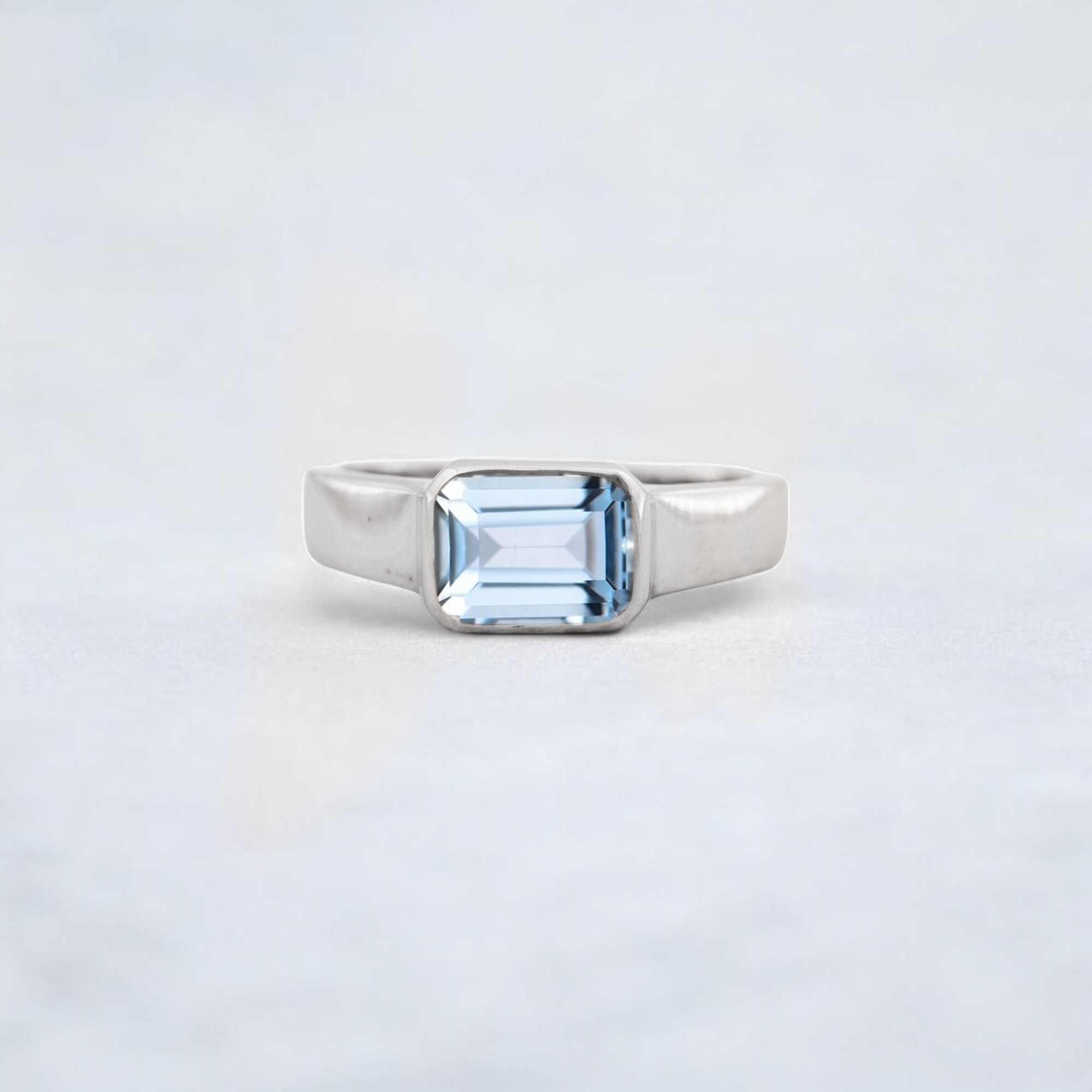 Solitaire Aquamarine Engagement Ring, Solid Gold Engagement Ring, Minimalist Statement Ring, Bezel Set Birthday Gift For Love ice blue bezel ring, sea-inspired solitaire, clean line gemstone ring, ocean energy ring, soft blue modern jewelry, tranquil blue stone ring, chic aquamarine piece, calming luxe ring, understated gemstone design, classic with a twist ring