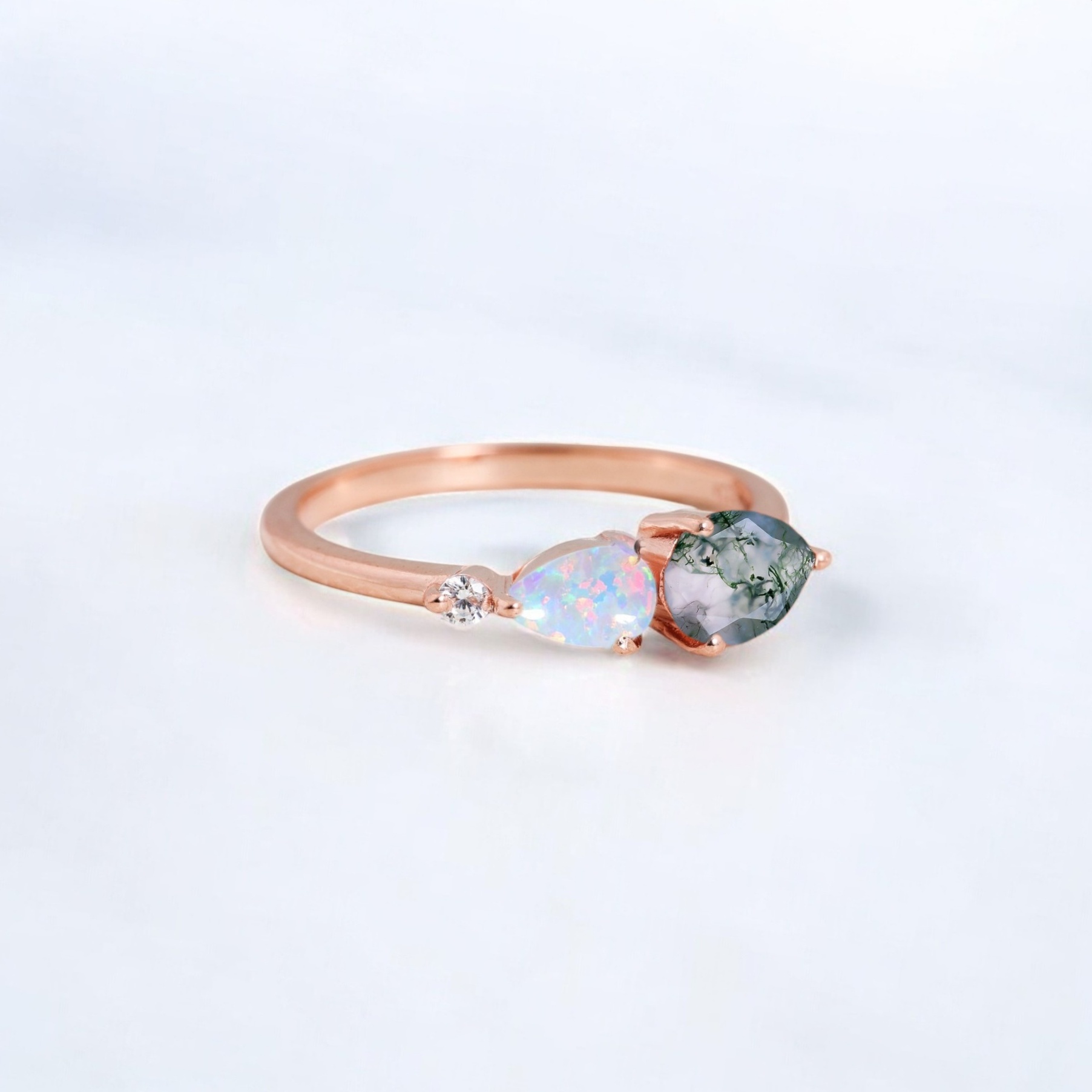 Natural Moss Agate Women Ring Fire Opal Diamond Wedding Ring Yellow Gold Handmade Jewelry Birthday Gift For Wife This Natural Moss Agate Engagement Ring is a stunning choice for a unique and meaningful proposal. The Moss Agate gemstone, with its beautiful green hues and earthy patterns, symbolizes growth, harmony, and new beginnings—making it the perfect stone for an engagement ring. Accented with luminous Opal, this ring adds an iridescent touch of elegance and charm. Crafted in 14K Yellow Gold, this ring exudes warmth and luxury, offering a timeless appeal that will be treasured forever. Whether as an Engagement Ring or a Proposal Ring, it’s an ideal alternative to traditional diamond jewelry, with its earthy, one-of-a-kind design. Perfect as an Anniversary Gift for your wife, this ring is a deeply personal piece of Personalized Jewelry that celebrates your love and connection. Its natural beauty and thoughtful craftsmanship make it a standout choice for those seeking something distinctive and meaningful to mark a special occasion.