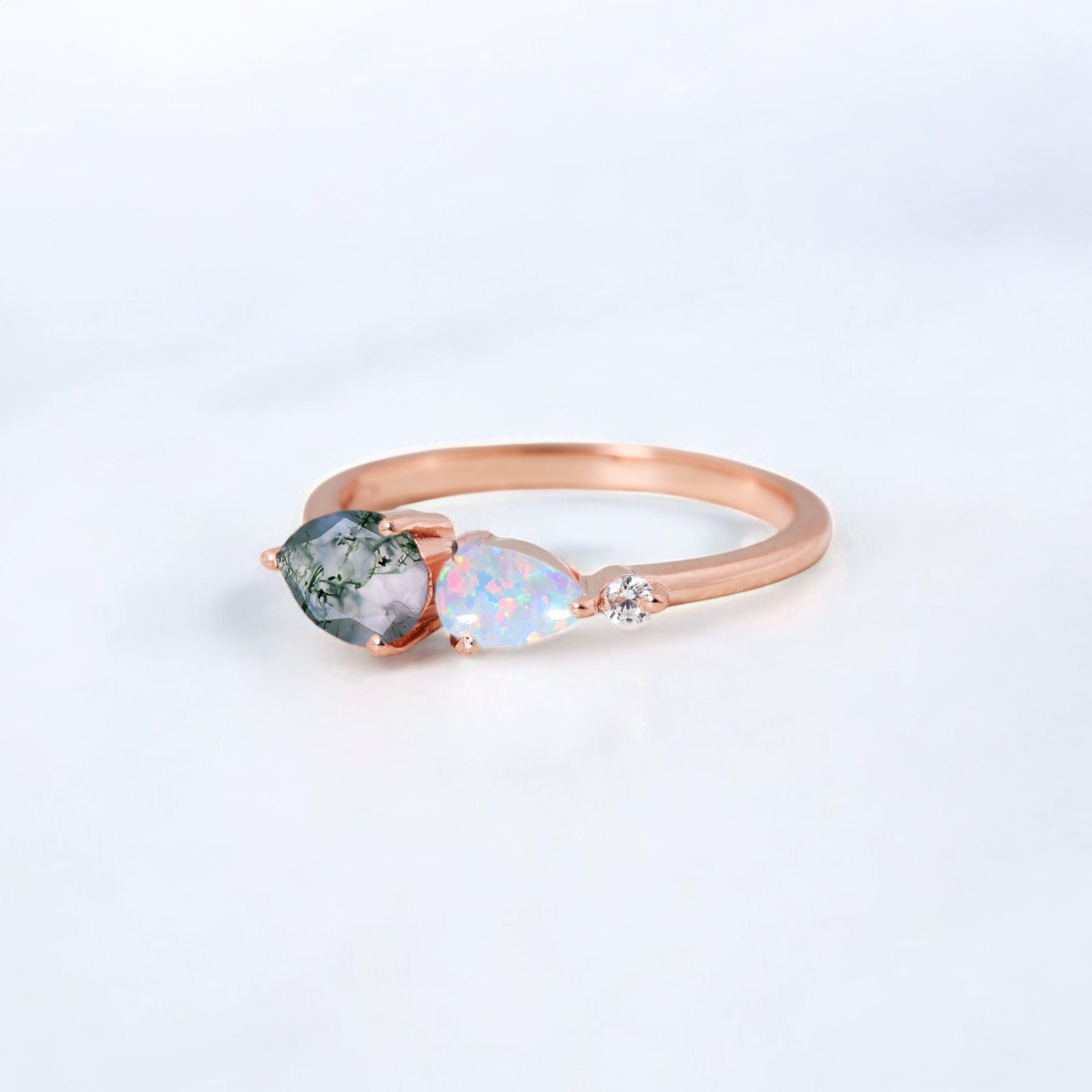 Natural Moss Agate Women Ring Fire Opal Diamond Wedding Ring Yellow Gold Handmade Jewelry Birthday Gift For Wife This Natural Moss Agate Engagement Ring is a stunning choice for a unique and meaningful proposal. The Moss Agate gemstone, with its beautiful green hues and earthy patterns, symbolizes growth, harmony, and new beginnings—making it the perfect stone for an engagement ring. Accented with luminous Opal, this ring adds an iridescent touch of elegance and charm. Crafted in 14K Yellow Gold, this ring exudes warmth and luxury, offering a timeless appeal that will be treasured forever. Whether as an Engagement Ring or a Proposal Ring, it’s an ideal alternative to traditional diamond jewelry, with its earthy, one-of-a-kind design. Perfect as an Anniversary Gift for your wife, this ring is a deeply personal piece of Personalized Jewelry that celebrates your love and connection. Its natural beauty and thoughtful craftsmanship make it a standout choice for those seeking something distinctive and meaningful to mark a special occasion.