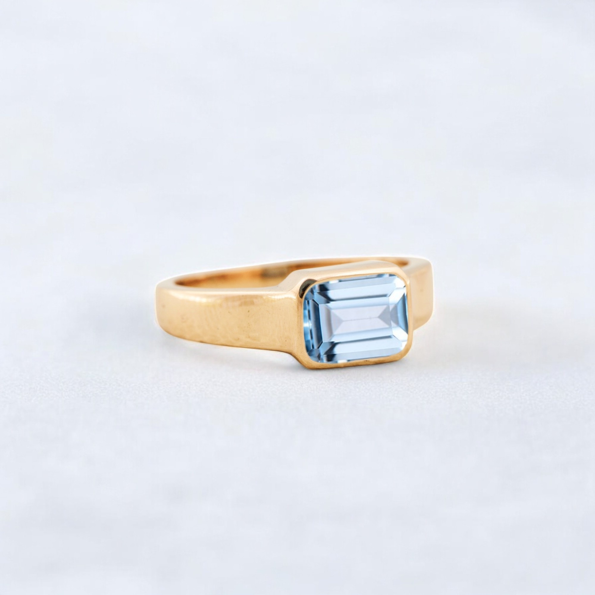 Solitaire Aquamarine Engagement Ring, Solid Gold Engagement Ring, Minimalist Statement Ring, Bezel Set Birthday Gift For Love ice blue bezel ring, sea-inspired solitaire, clean line gemstone ring, ocean energy ring, soft blue modern jewelry, tranquil blue stone ring, chic aquamarine piece, calming luxe ring, understated gemstone design, classic with a twist ring