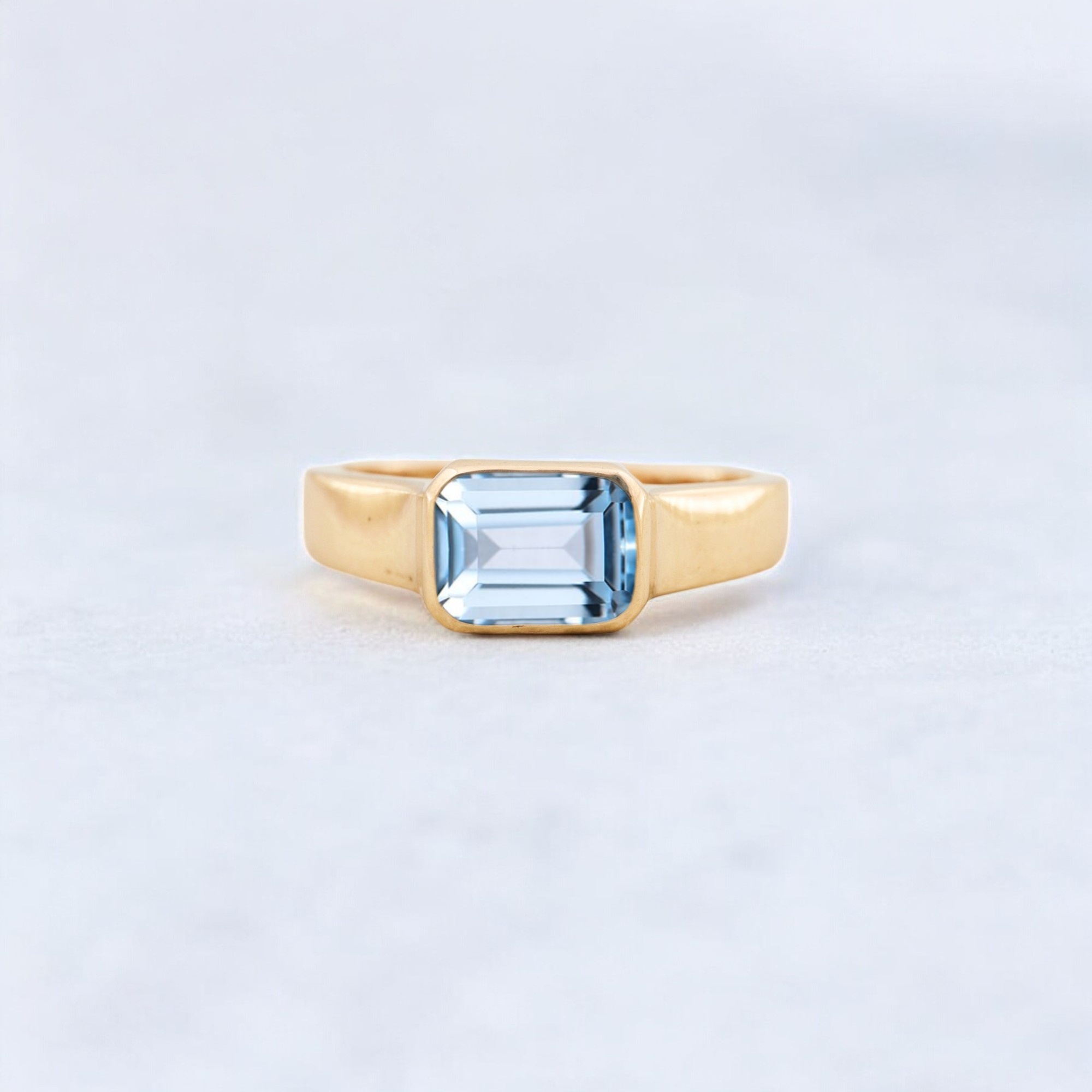 Solitaire Aquamarine Engagement Ring, Solid Gold Engagement Ring, Minimalist Statement Ring, Bezel Set Birthday Gift For Love ice blue bezel ring, sea-inspired solitaire, clean line gemstone ring, ocean energy ring, soft blue modern jewelry, tranquil blue stone ring, chic aquamarine piece, calming luxe ring, understated gemstone design, classic with a twist ring