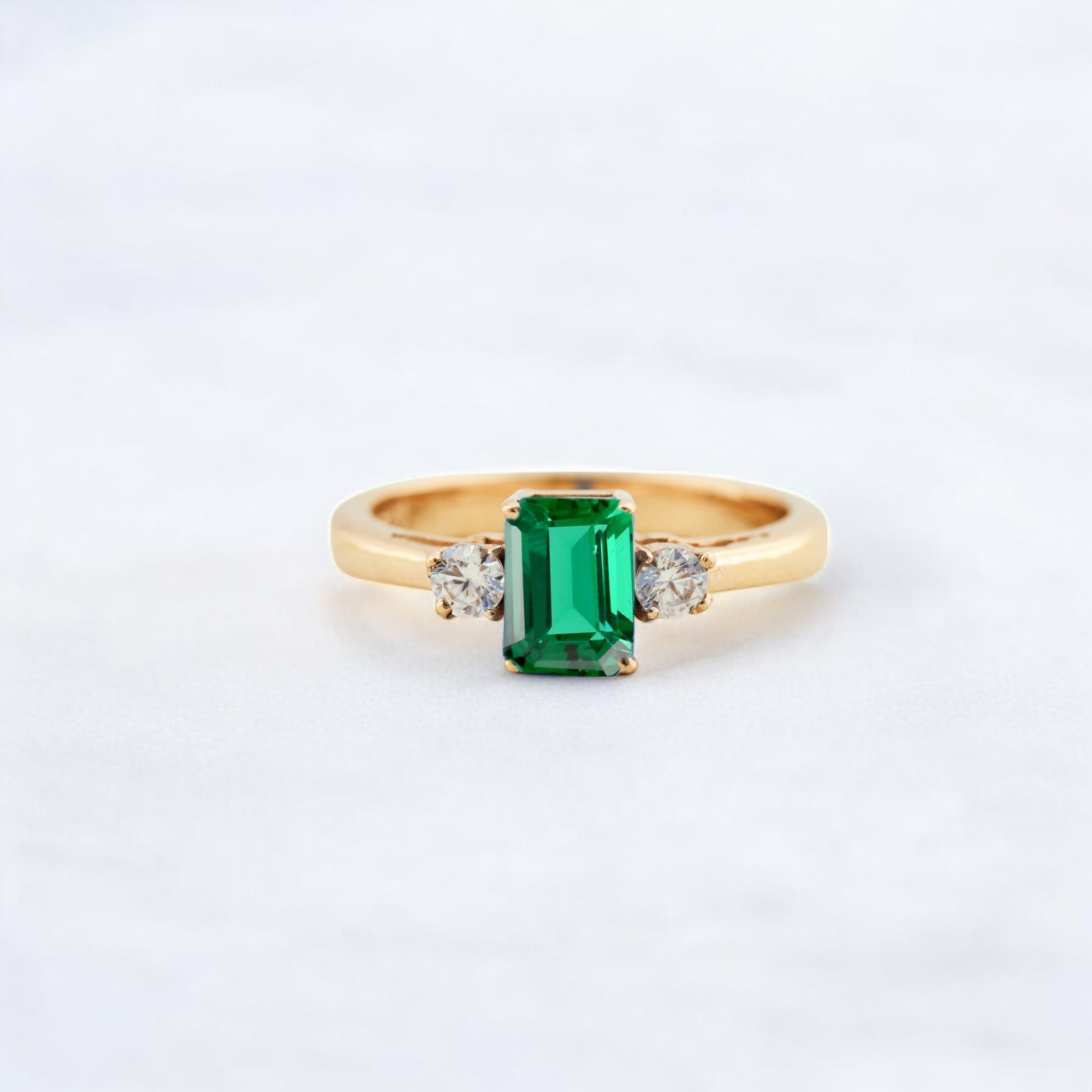 Green Emerald Engagement Ring Diamond Wedding Promise Ring May Birthstone Gift Jewelry Yellow Gold Customized Ring This Green Emerald Engagement Ring features a stunning emerald stone, the May birthstone, representing love and renewal. Set in luxurious yellow gold, the ring combines timeless elegance with a modern twist. The emerald gemstone’s rich green hue symbolizes growth, making it a perfect choice for an engagement or promise ring. The diamond accents surrounding the emerald add an extra layer of sparkle and sophistication to the design. Ideal as a customized engagement ring, this ring reflects both love and personal style. The yellow gold band enhances the emerald's vibrancy, creating a radiant and eye-catching look. A perfect May birthstone gift, this ring is a thoughtful and meaningful gift for a loved one. Whether as a wedding ring or promise ring, this piece symbolizes a lifetime of commitment and love. Handcrafted with precision and care, this personalized jewelry piece is one-of-a-kind. A custom ring designed to showcase the unique beauty of the emerald, making it a standout piece. This green emerald ring is a perfect choice for those who appreciate the deep symbolism of birthstones in their jewelry.