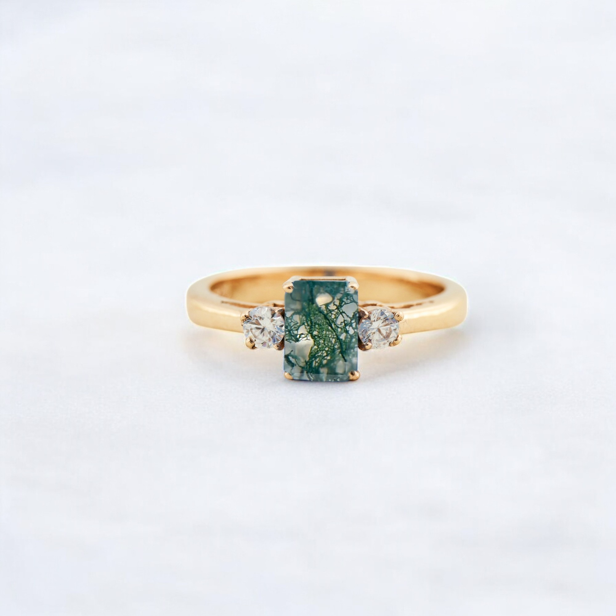 Emerald Cut Moss Agate Engagement Ring Diamond Promise Stacking Ring Yellow Gold Personalized jewelry Anniversary Gift For Wife This Emerald Cut Moss Agate Engagement Ring features a stunning green stone that symbolizes nature’s growth and harmony. Set in luxurious yellow gold, the ring offers a warm, timeless appeal that’s perfect for any occasion. The Moss Agate stone’s unique patterns make this ring a one-of-a-kind piece, full of character and beauty. Paired with a diamond promise stacking ring, this set offers both elegance and a touch of sparkle. A perfect anniversary gift for wife, this set marks the beauty of your love and commitment. Handcrafted with love and care, this personalized jewelry set is a meaningful keepsake. Ideal for an engagement ring or a promise ring, this design symbolizes both strength and beauty. The yellow gold setting enhances the natural beauty of the Moss Agate and diamond accents. The combination of Moss Agate and diamonds creates a harmonious design that’s both unique and elegant. This personalized jewelry piece adds a meaningful touch, making it perfect for celebrating your love story. The diamond promise stacking ring adds a stunning contrast to the earthy tones of the Moss Agate. A timeless and elegant set, this ring can be worn together or separately, offering versatility in styling. Whether as a gift for your wife or to commemorate a special moment, this set is a perfect choice. The Emerald Cut Moss Agate offers a unique take on traditional engagement rings, adding a touch of nature to your love. Designed with exceptional craftsmanship, this set will remain a cherished symbol of love for years to come.