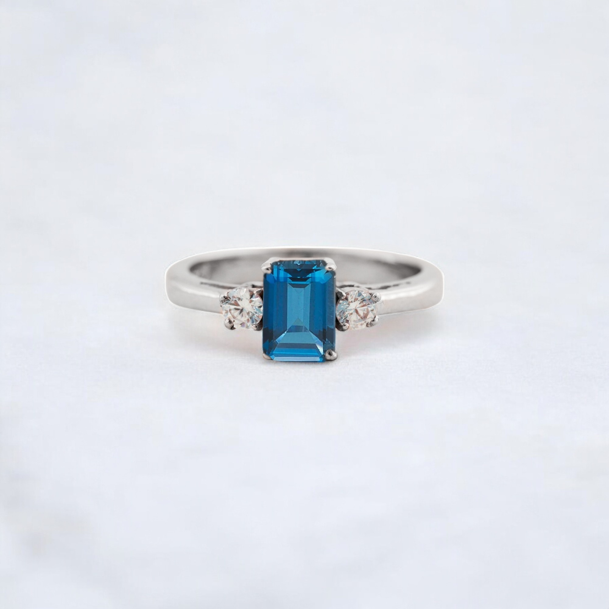 Blue Topaz Women Ring Diamond Wedding Stacking Ring Sterling Silver Bridesmaid Jewelry Birthday Gift For Daughter This Blue Topaz Women’s Ring features a stunning gemstone that shines with a vibrant blue hue. Set in luxurious sterling silver, the ring exudes elegance and timeless appeal. Paired with a diamond wedding stacking ring, this set offers a perfect blend of sparkle and sophistication. Ideal as a birthday gift for daughter, this ring set will surely make her feel special and loved. The blue topaz stone represents tranquility and peace, making it a meaningful choice for any occasion. Perfect as a bridesmaid jewelry gift, this set adds a touch of glamour to any wedding day ensemble. The diamond accents on the stacking ring add a subtle yet stunning touch of brilliance. Handcrafted with precision, this sterling silver jewelry set is designed to last and remain a cherished keepsake. A perfect balance of beauty and craftsmanship, making it a standout piece for any jewelry lover. This elegant set can be worn together or separately, offering versatility and style. The blue topaz gemstone adds a unique pop of color, complementing the diamond accents beautifully. A bridesmaid gift that will be treasured long after the wedding, symbolizing friendship and love. Ideal for special occasions, this set makes a thoughtful and lasting gift. The sterling silver setting enhances the beauty of the stones, ensuring a timeless and polished look. A meaningful and stunning gift for anyone who appreciates fine jewelry with a personal touch.