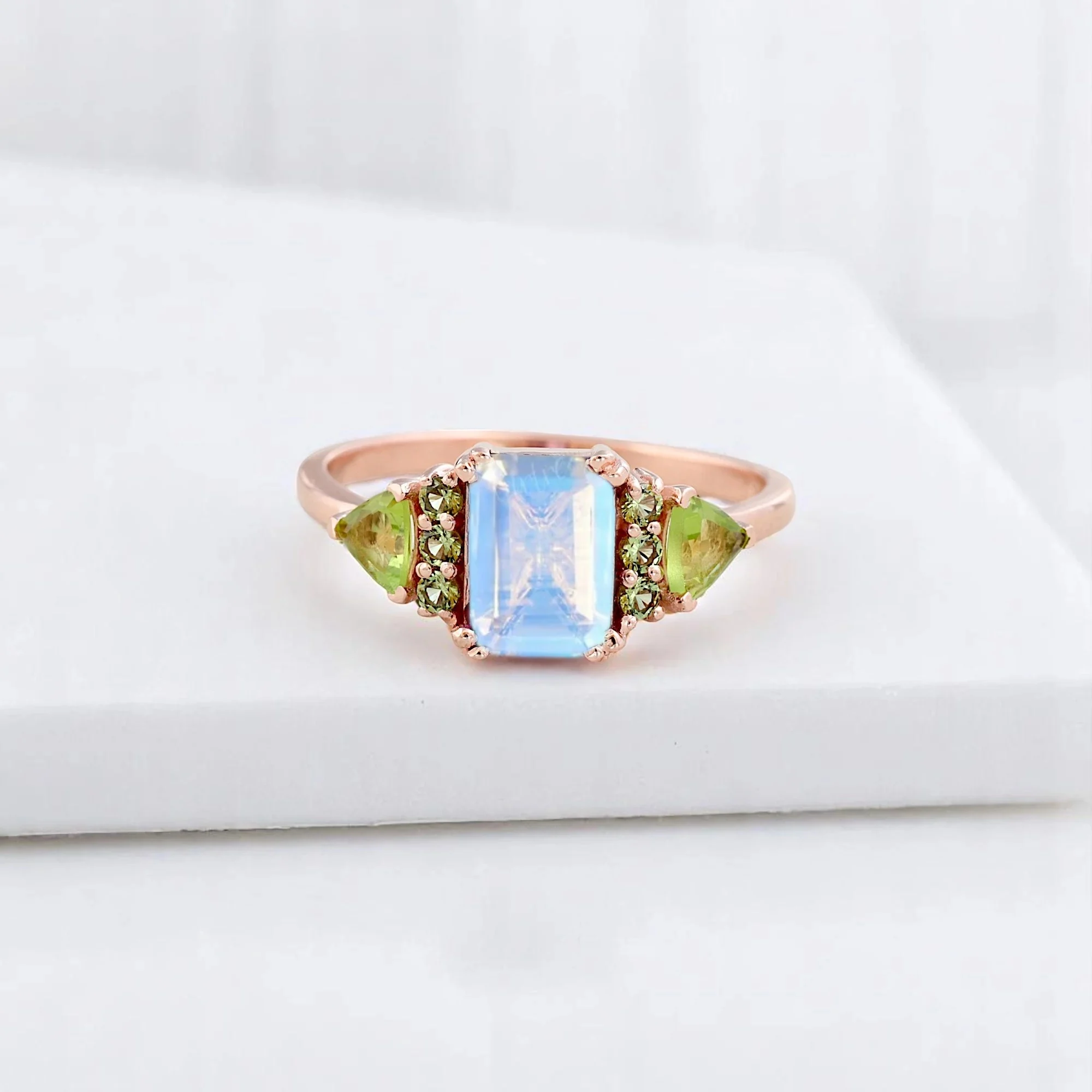 Emerald Cut Natural Moonstone Women Ring Bridal Peridot Cluster ring Art Deco Statement Ring Anniversary Gift For Wife Emerald cut moonstone ring with peridot cluster Natural moonstone and peridot bridal statement ring Art Deco style moonstone engagement or anniversary ring Women's emerald-cut moonstone ring with green gemstones Statement moonstone and peridot cluster ring for her Elegant bridal ring with emerald-cut moonstone and peridot accents