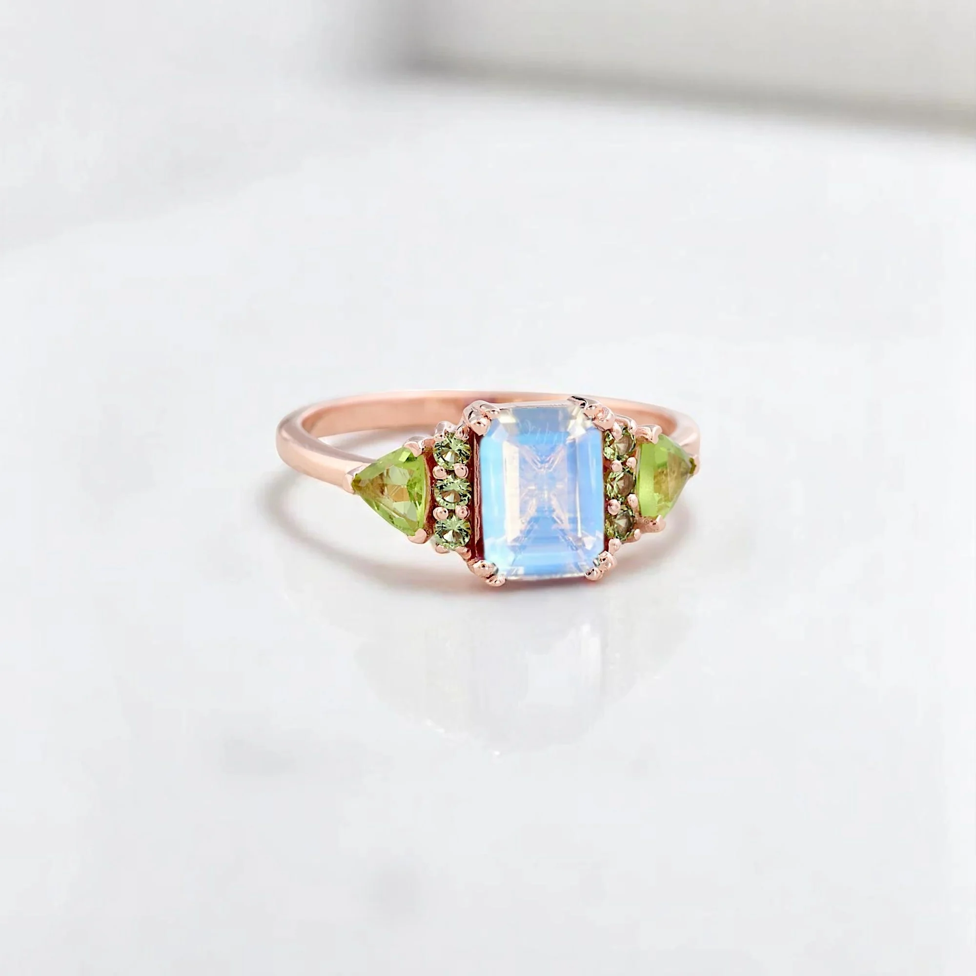 Emerald Cut Natural Moonstone Women Ring Bridal Peridot Cluster ring Art Deco Statement Ring Anniversary Gift For Wife Emerald cut moonstone ring with peridot cluster Natural moonstone and peridot bridal statement ring Art Deco style moonstone engagement or anniversary ring Women's emerald-cut moonstone ring with green gemstones Statement moonstone and peridot cluster ring for her Elegant bridal ring with emerald-cut moonstone and peridot accents