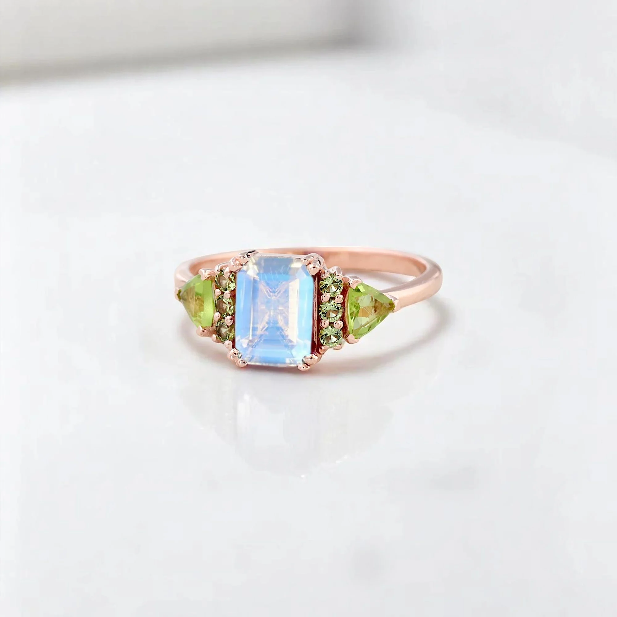Emerald Cut Natural Moonstone Women Ring Bridal Peridot Cluster ring Art Deco Statement Ring Anniversary Gift For Wife Emerald cut moonstone ring with peridot cluster Natural moonstone and peridot bridal statement ring Art Deco style moonstone engagement or anniversary ring Women's emerald-cut moonstone ring with green gemstones Statement moonstone and peridot cluster ring for her Elegant bridal ring with emerald-cut moonstone and peridot accents