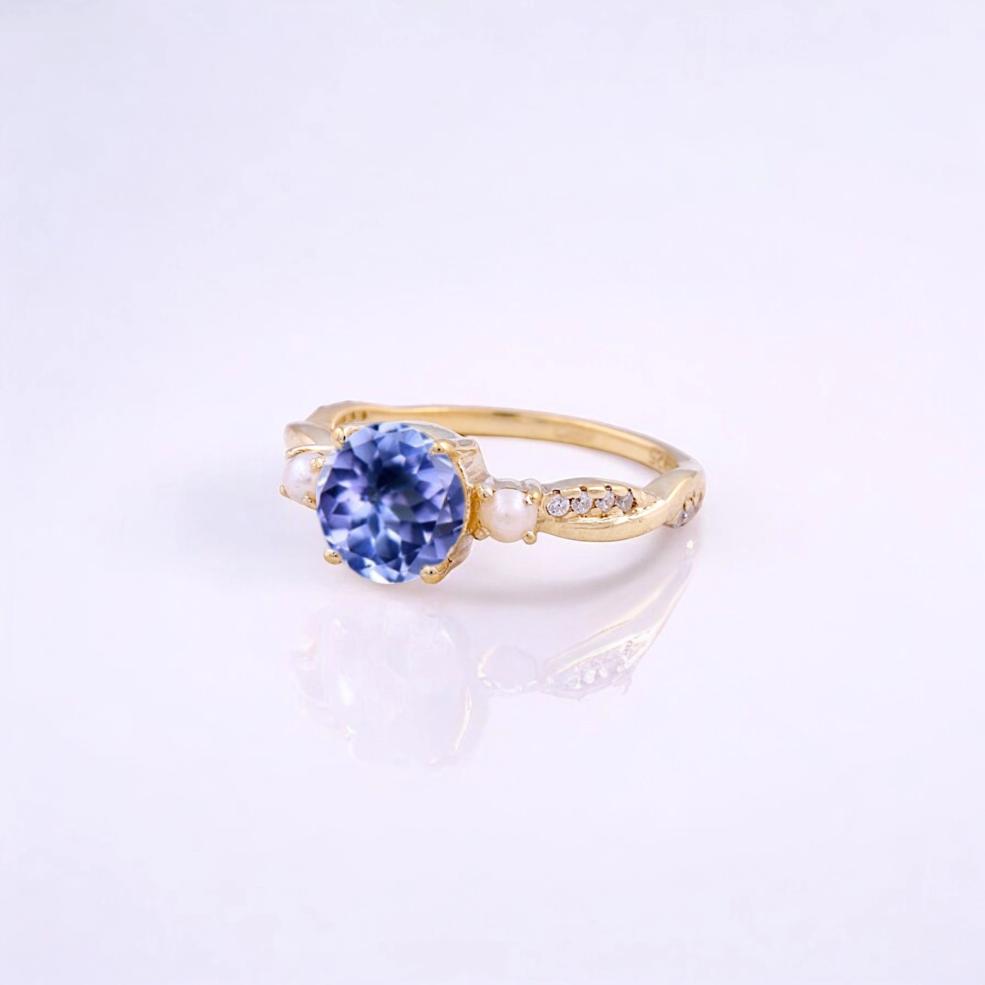 Round Shape Tanzanite Engagement Ring Pearl Bridal Wedding Jewelry Art Deco Handmade Proposal Ring Yellow Gold Gift Ring tanzanite and pearl ring, art deco engagement ring, handmade bridal jewelry, round cut tanzanite ring, yellow gold gemstone ring, vintage-inspired proposal ring, tanzanite pearl wedding ring, December birthstone jewelry, elegant gift for her, antique style ring